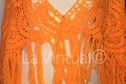 Orange handmade crocheted shawl