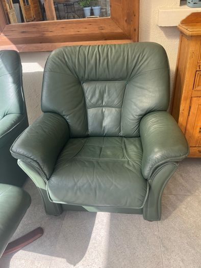 green leather armchairs