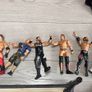 WWE wrestling ring with figures and championship belt Image 2