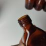 316 - Set of 9 Different Sizes Amber Glass Collectible Decorative Bottles and Jars Image 9