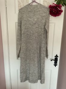 jumper boutique brand jumper /jumper dress size small with unusual side slit