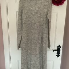 jumper boutique brand jumper /jumper dress size small with unusual side slit