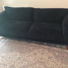blue three seater sofa