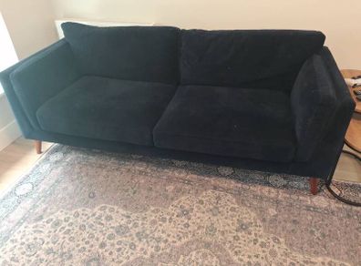 blue three seater sofa