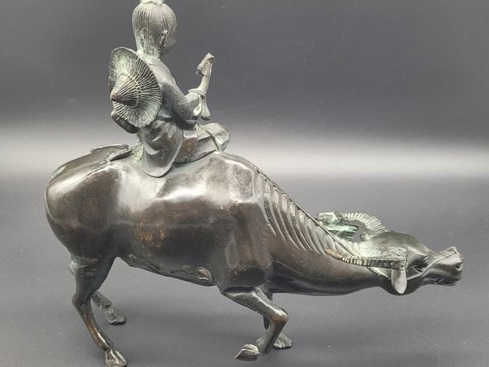 Antique Chinese Bronze of Lohan Seated On An Ox 19th Century