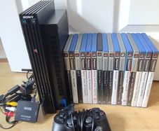 ps2 console with 2 controllers and 14 games