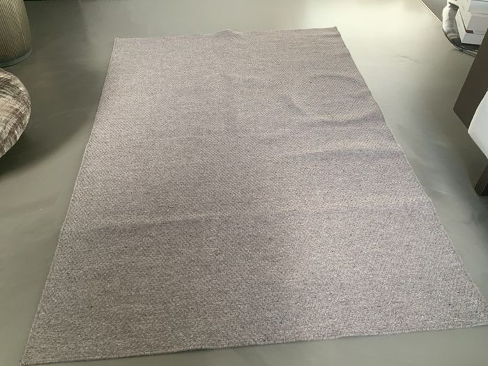 Woollen dark beige rug