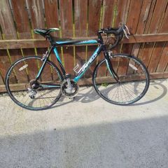 Aluminian road bike size of bike is 54 cm all working, perfect on it.