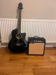 guitar with amp. It has an auto tuner unwanted gift