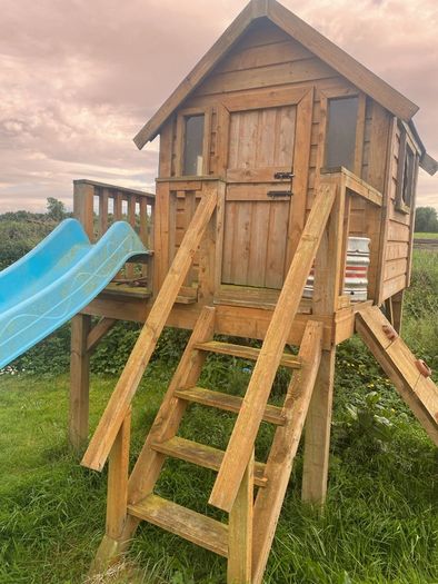 Playhouse with slide climbing frame stairs etc
