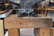 anvil on timber stand