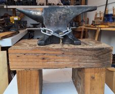anvil on timber stand
