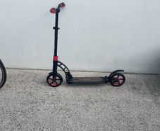Aero C8 black and red scooter. Barely used. Perfect condition.