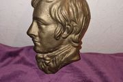 Vintage brass plaque of unknown man