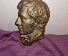 Vintage brass plaque of unknown man