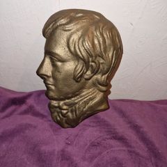 Vintage brass plaque of unknown man