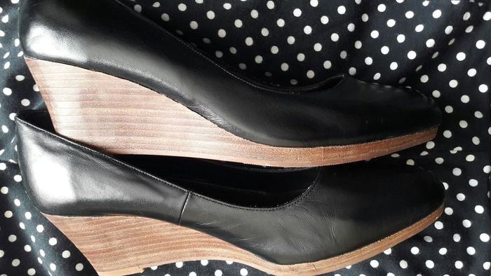 Black shoes with brown wedge heel