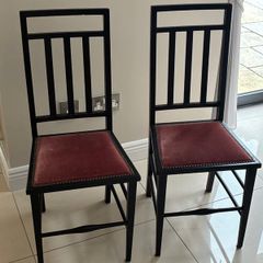 Pair of black wooden Edwardian casual chairs with velvet seats