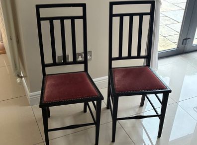 Pair of black wooden Edwardian casual chairs with velvet seats