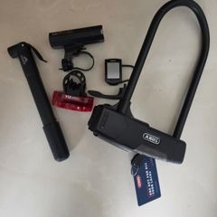 Cateye Bike lights and Abus U lock. Cateye Speedometer (needs battery)