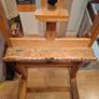 Easel And Selection Of Paints And Book Image 9