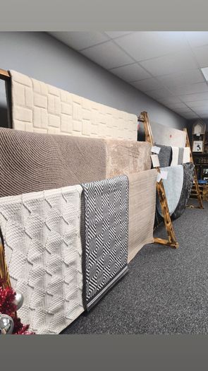 Shop fittings chandler stand with electrical wiring + rug stands