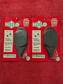 Device to raise and lower hanging basket for watering