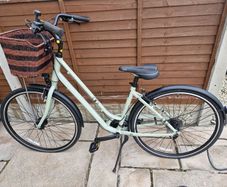 Bike including basket, helmet, lock and pump