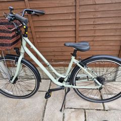 Bike including basket, helmet, lock and pump