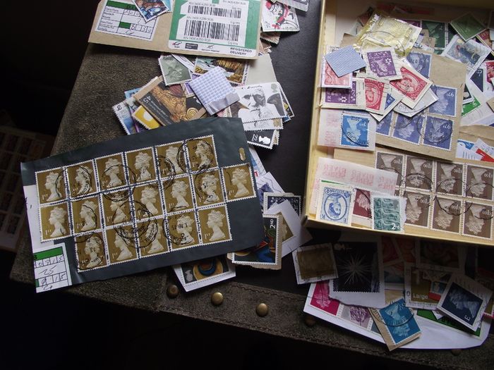 A box with collection of stamps from Great Britain