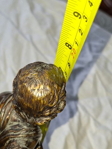Bronzed Winged Cherub putto open seashell or leaf-shaped vessel with a scorpion like tail.