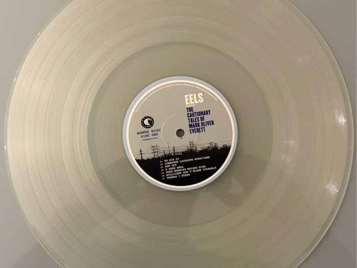 Eels - Perform The Cautionary Tales of Mark Oliver Everett. Double Deluxe LP Release on clear vinyl. Played once and good as new.