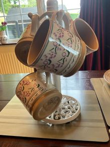 Nicholas Mosse new large lavender mugs land a new cream cast iron mug holder
