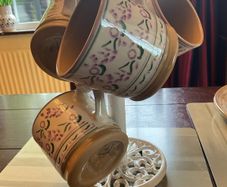 Nicholas Mosse new large lavender mugs land a new cream cast iron mug holder