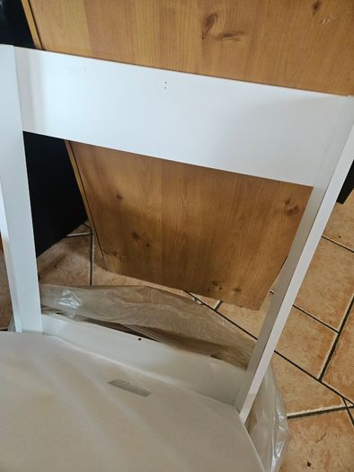 Cot top changer with firm sided changing mat