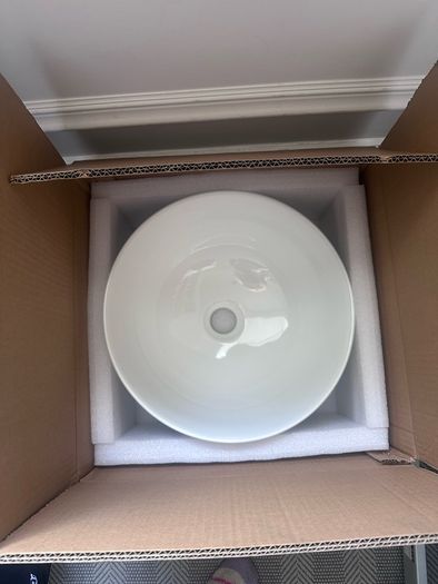 Brand new porcelain bathroom sink