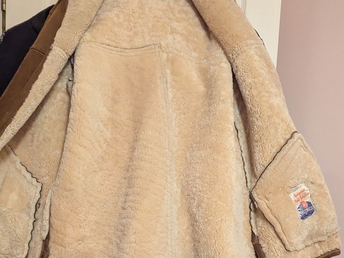 Vintage mans Sheepskin coat size Medium.
