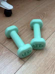 A pair of 1kg dumb bells