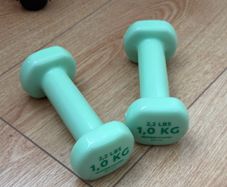 A pair of 1kg dumb bells