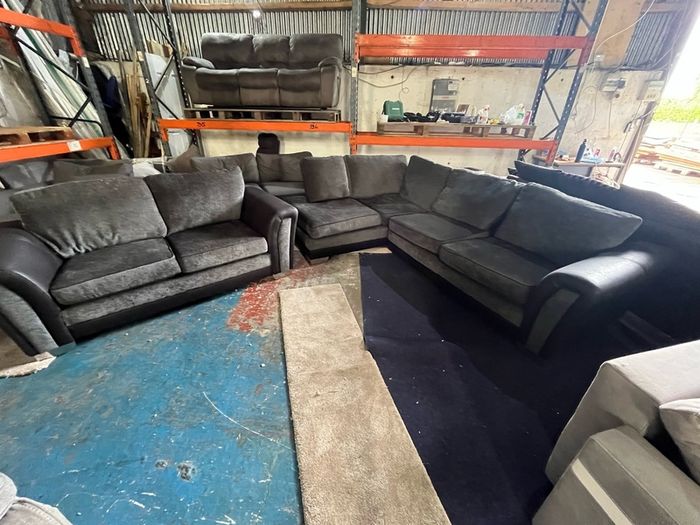 Black corner sofa with matching 2 seater