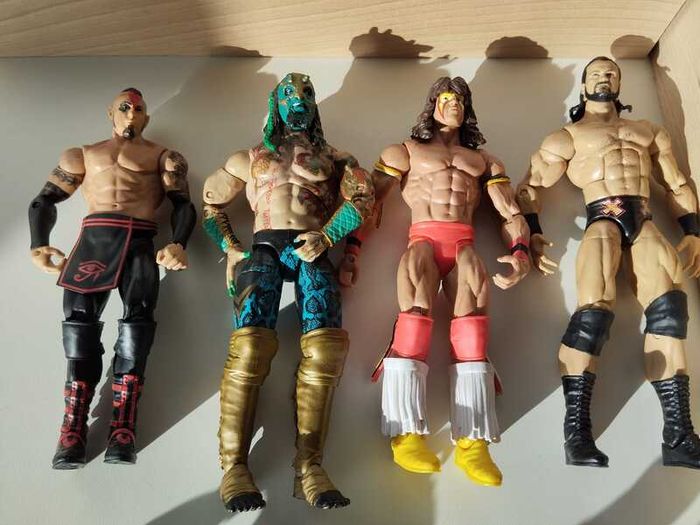 WWE Wrestling Action Figures  4 Figure Bundle
