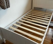 Single white wooden bed frame