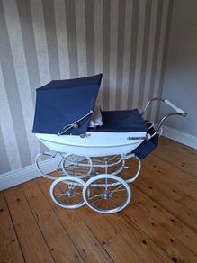 Sliver cross dolls pram