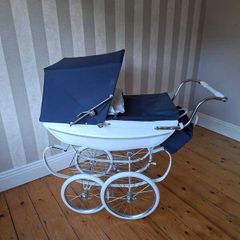 Sliver cross dolls pram