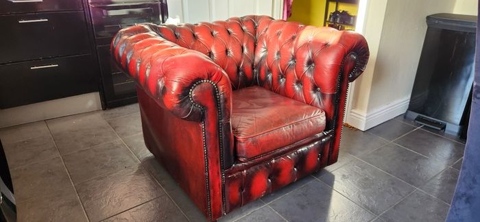 Red leather Chesterfield armchair