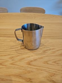 Milk jug and thermometer