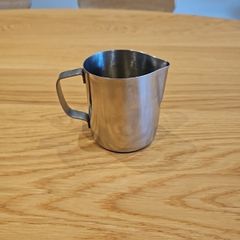 Milk jug and thermometer