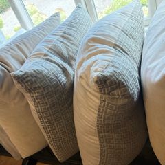 8 large Feather Filled Cushions