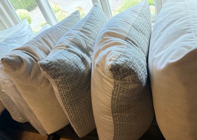 8 large Feather Filled Cushions