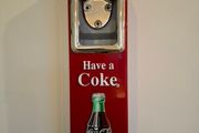 Vintage Coca-Cola wall-mount bottle opener and cap catcher